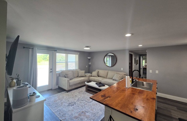 Delightful 3-bedroom 2 Bath House with serene setting in Williamsburg MI.