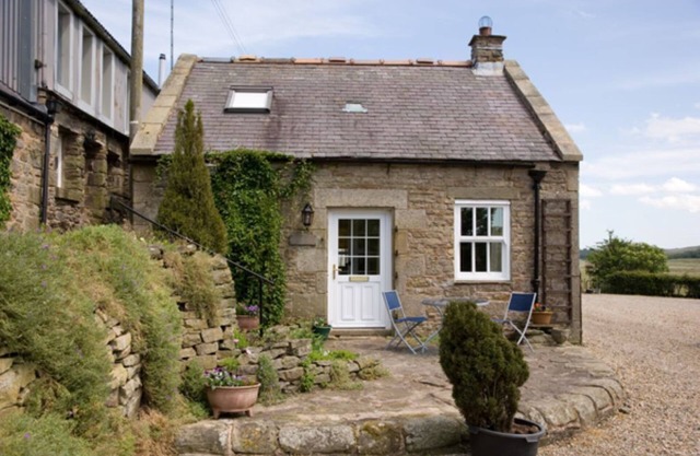 Charmante maison en pierre sur le mur d'Hadrien dans le parc national de Northumberland
