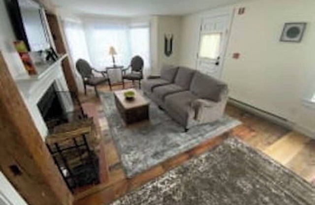 Deluxe King, Living Room w/sofa bed, bunk bed & fireplace