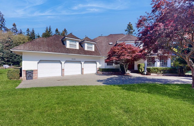 Designer bay-view estate with home office and 400 feet of waterfront