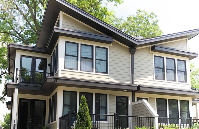 Designer home is short walk to Rupp & Manchester