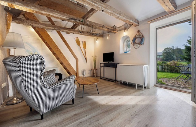 "Die Kajüte" avec terrasse et jardin privés