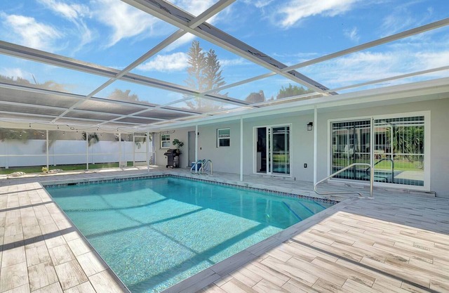 Discover the welcoming golf community of Rotonda West in this beautifully styled home