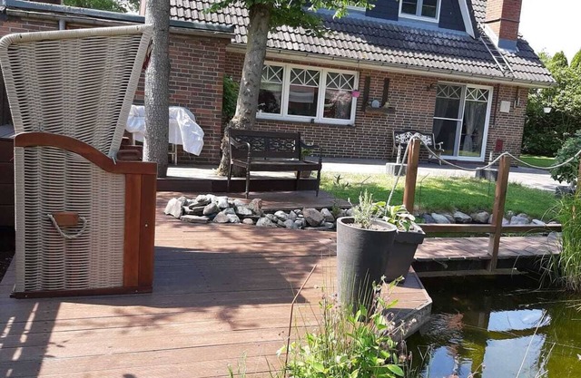 "Discover Ultimate Relaxation at Ferienhaus Friesenbude Safe Haven!"