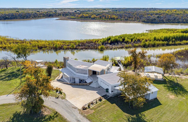 Dock & Fire Pit: Riverfront Runaway Bay Retreat