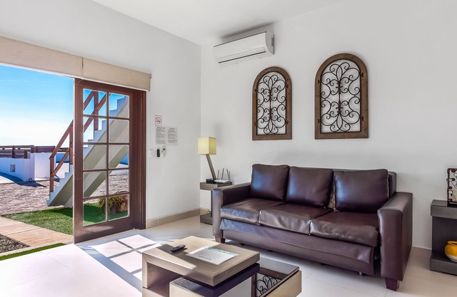 Dog-friendly beach haven with heated pool, hot tub, kitchenette, patio, AC