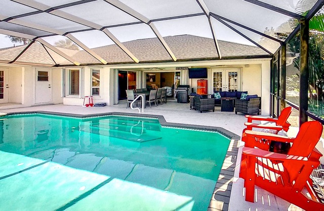 Dog-friendly canal view retreat with a private pool, A/C, & washer/dryer