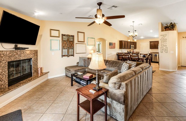 Dog-friendly home with fenced yard, firepit, fireplace, W/D & AC