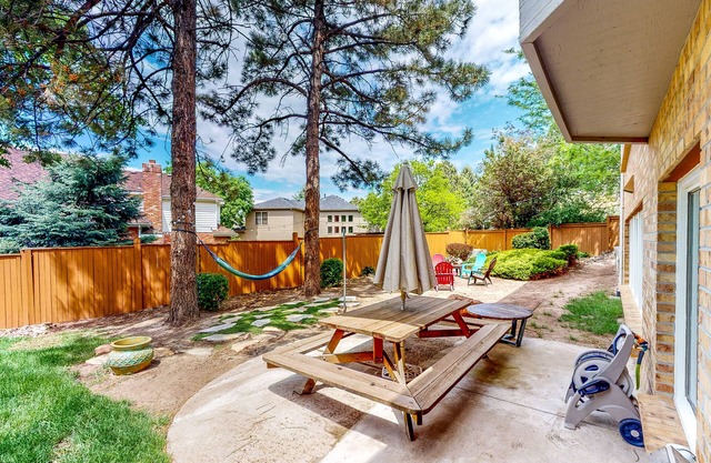Dog-friendly home with large, enclosed yard, gourmet kitchen, & washer/dryer