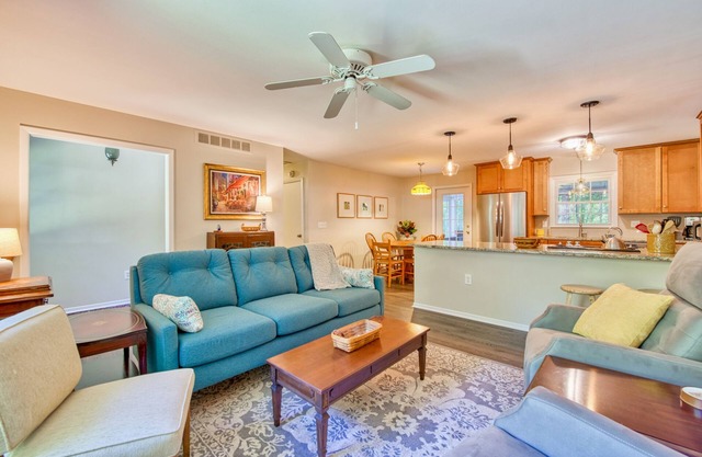Dog-friendly home with large yard, lawn games, firepit, screened porch, & AC