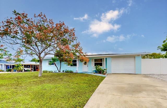 Dog-friendly home with private pool, patio, firepit, beach gear, AC, & W/D