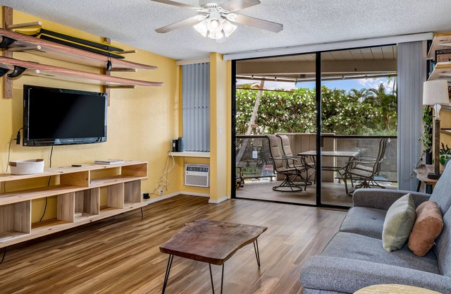 Dog-friendly island gem with balcony, shared pool/hot tub, & beach access nearby