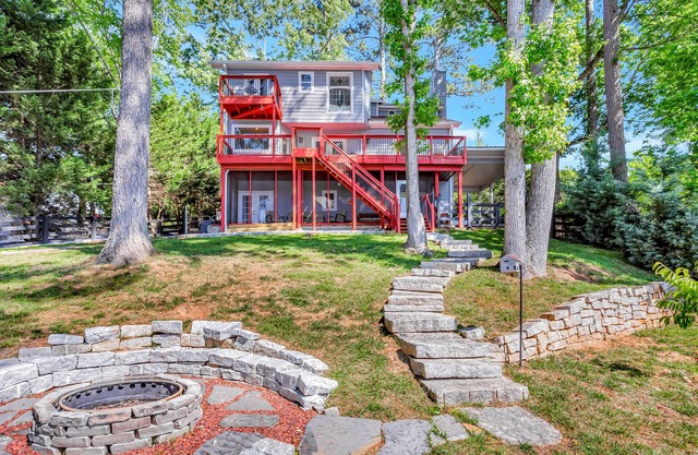 Dog-friendly lake house with dock, decks, firepit, grill, fireplace, & WiFi
