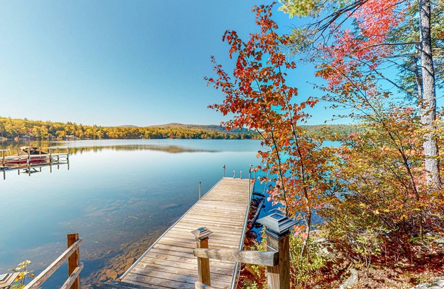 Dog-friendly lakefront cottage with private beach and dock, lake views, and W/D