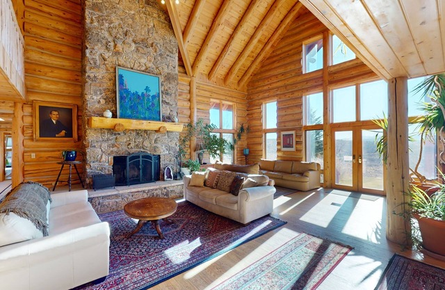 Dog-friendly, mountain view lodge with a game room, fireplace, large deck, & W/D