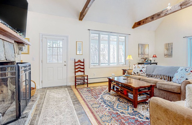 Dog-friendly mountain-view home with private 7-person hot tub, fireplace, & deck