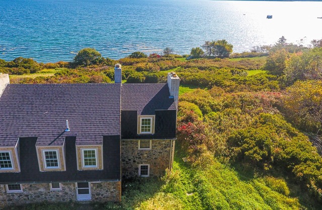 Dog-friendly oceanfront stone house with beach access, stunning views & deck