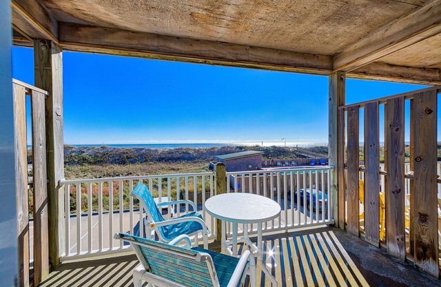 Dog-friendly oceanfront condo with balcony, outdoor pool, hot tub, and central AC