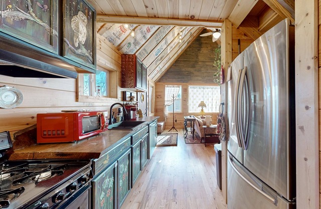 Dog-friendly riverfront home near FloydFest with fireplace, river views, & deck