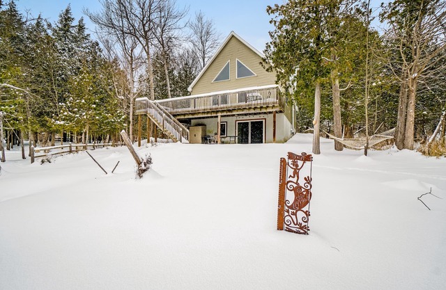 Dog-friendly riverside retreat with canoe, kayaks, paddle-board, and wood stove