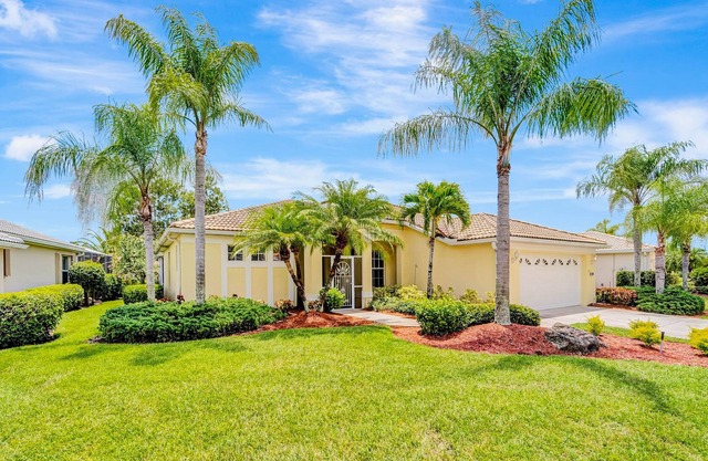 Dog-friendly water-view getaway w/ private pool, on-site golf, & fitness center