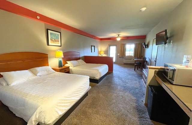 Chambres d'hôtel spacieuses situées au Spring Brook Resort | Vue imprenable sur le parcours de golf