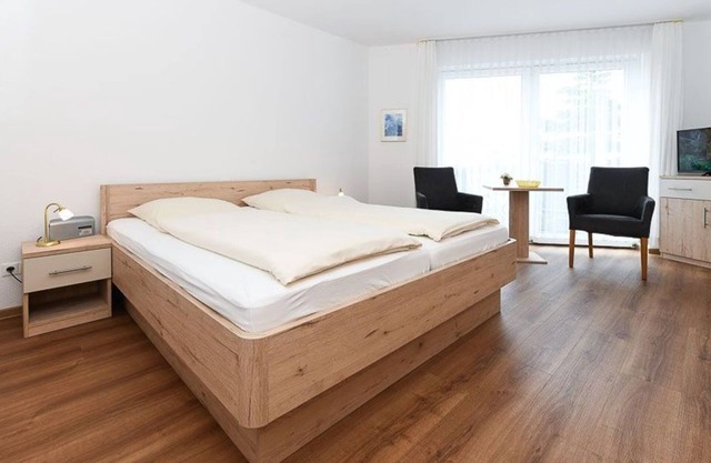 Double room with balcony or terrace - Double room in the Hotel-Pension