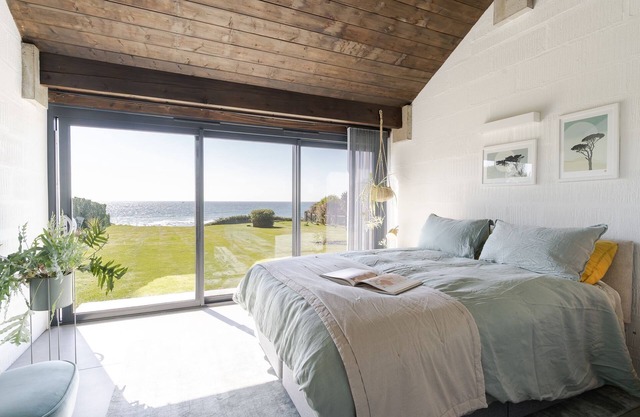 Downderlin is a light-filled beautiful home with a large garden that rolls directly onto the beach.