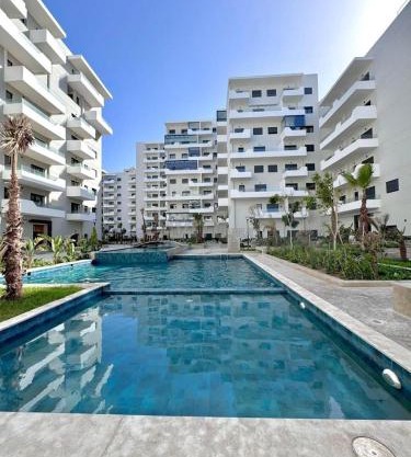 Duplex Luxe Vue Mer & Piscine à Zenata Eco City