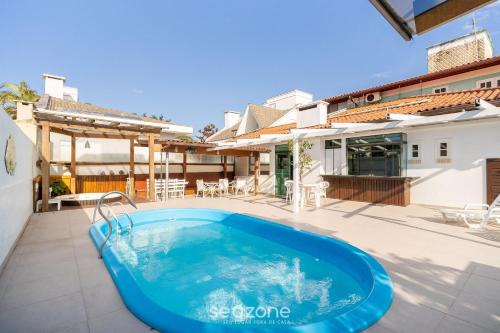 Duplex c/piscina 800m da praia em Jurerê DME025