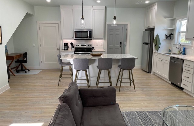 Easy access to Downtown Bentonville all king beds & fenced backyard!