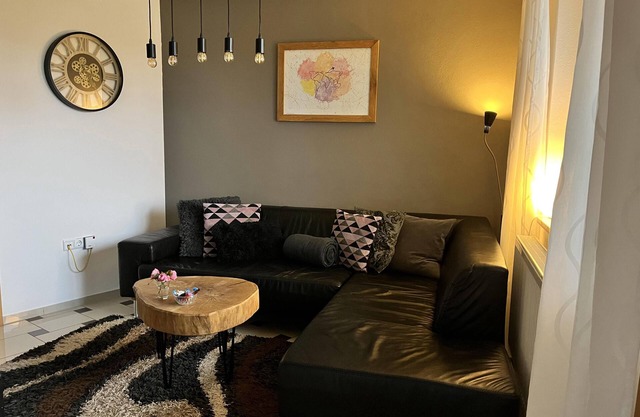 Appartement rez de chaussée (57m2) au sous-sol avec grande terrasse