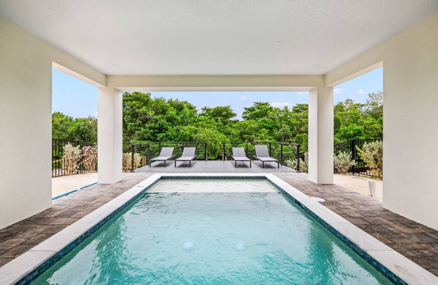 New Eco-Friendly Canal Front home with Private Dock and Pool -Salty Seagull