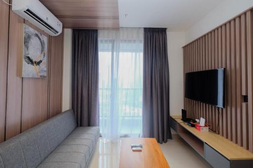 Elegant and Comfort 1BR at Ciputra World 2 Apartment By Travelio