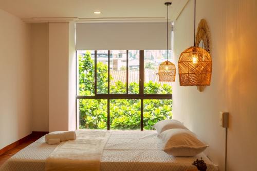 Elegante habitación baño compartido en Poblado-B11