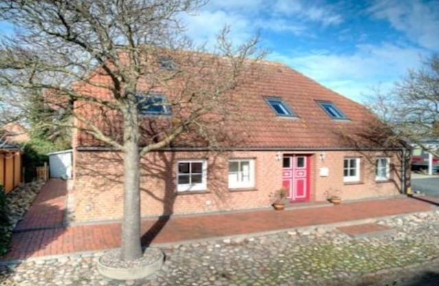 Charmante maison de vacances avec jardin à Fehmarn