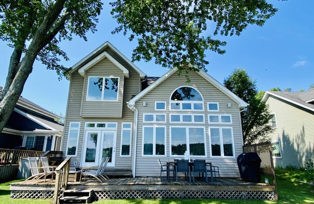 AMAZING CROOKED LAKE HOME ESCAPE WITH BEAUTIFUL DESIGNER FINISHES