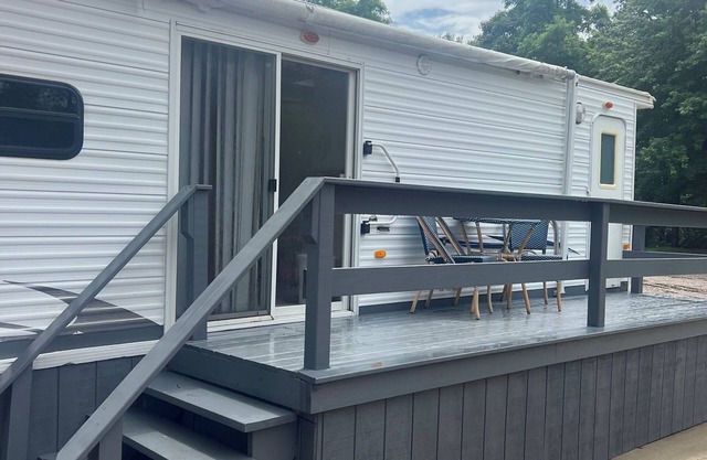 Enjoy a little bit of country living in this park model two bedroom trailer home