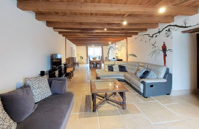 Enjoy a magnificent view of the countryside in this beautiful vacation home with pool.