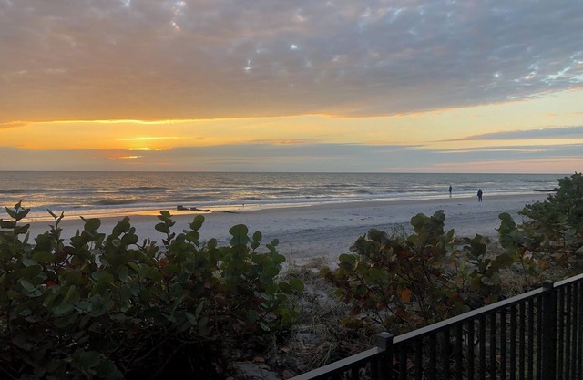 Enjoy PANORAMIC SUNSETS at this amazing MADEIRA BEACH Condo w/surround balcony!