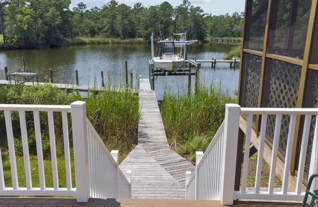 Profitez de la vue magnifique sur le ruisseau au Tranquil Waters Cottage