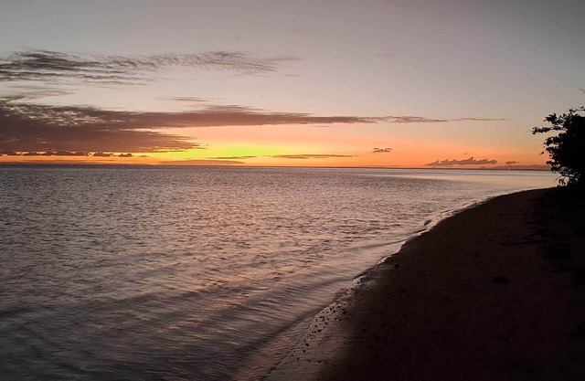 Enjoy your stay by the beach and sunset at a walking distance