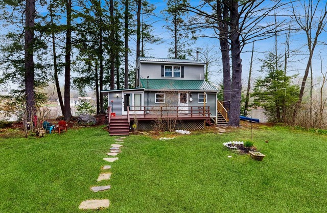 Entire lakefront duplex on Togus Pond with decks, canoe, 2 firepits & great view