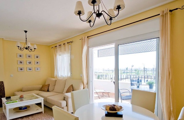 Great views over pools, golf course, lake & mountains from sunny balcony