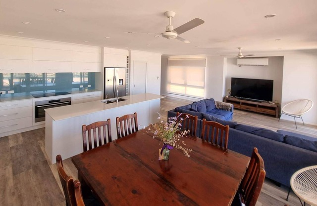 Escape to Exmouth! Walk to the beach from this waterfront home.