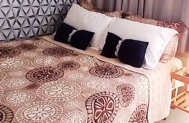 THE PROMENADE SUITES SM N0RTH QC MLA by Grass Residences