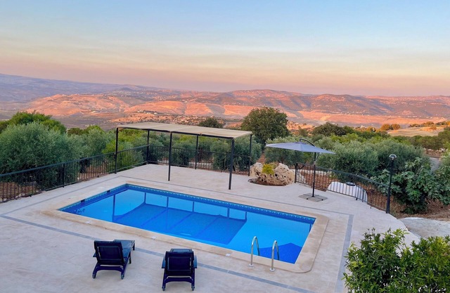 Escape to Zai Zaman Villa—stunning views, rustic charm, and a breathtaking pool.