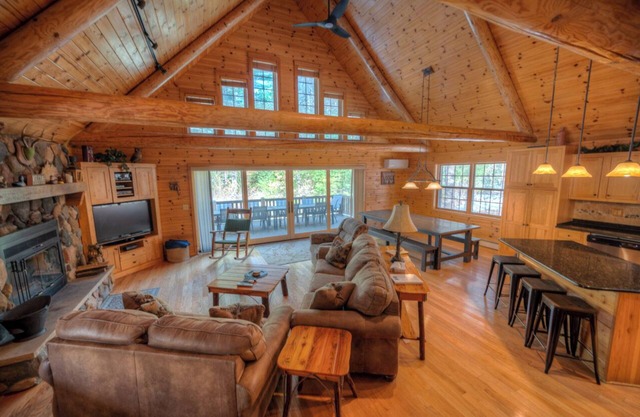 Exceptional log home on 9+ acres with frontage on Big St. Germain Lake
