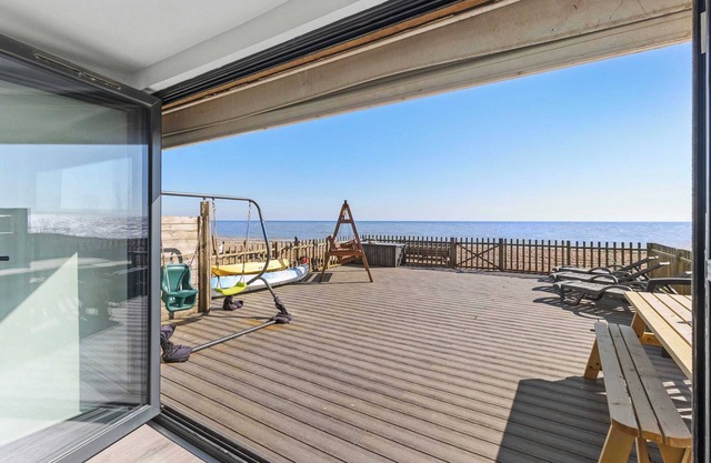 Exclusive Beachfront Home with Panoramic Views & Family Fun.