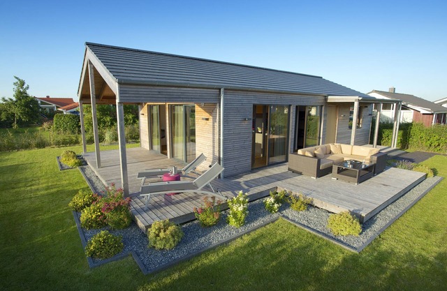 Maison de vacances au design exclusif faite de matériaux naturels sains avec un équipement de pointe